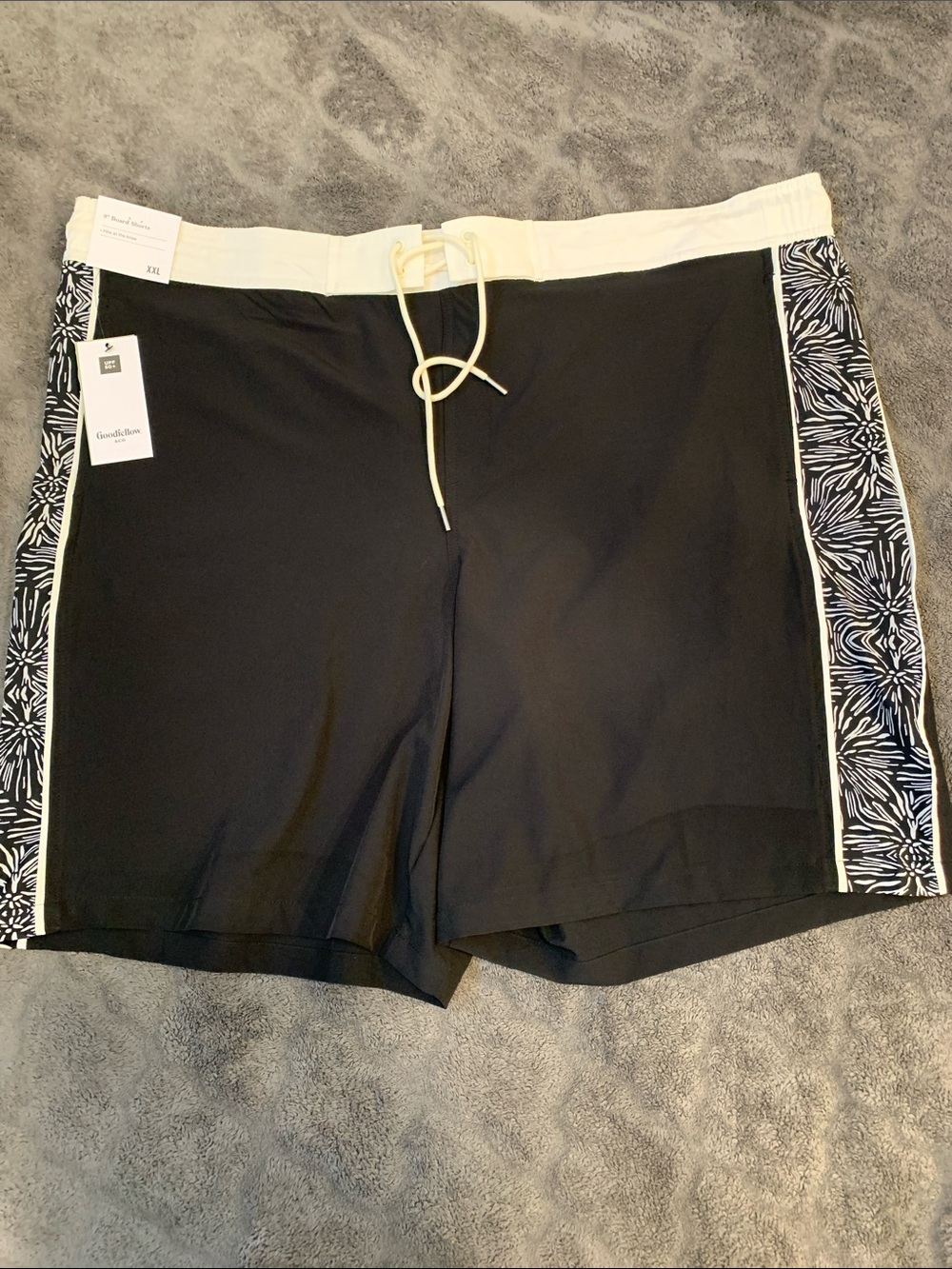 Black Swim Trunks with White Waistband and Printed Side Panels
Drawstring waist